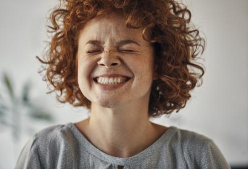 America's Best Guide to Dry Eye Syndrome: Happy Young Woman