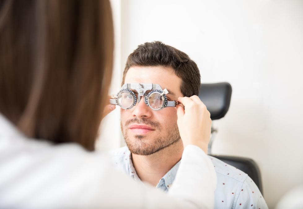 man getting eye exam