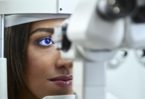 Woman taking an eye exam
