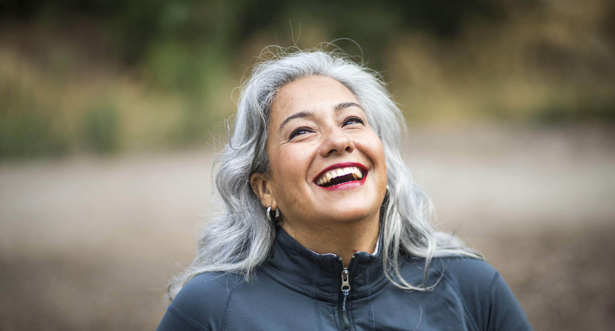 Silver-haired woman smiling