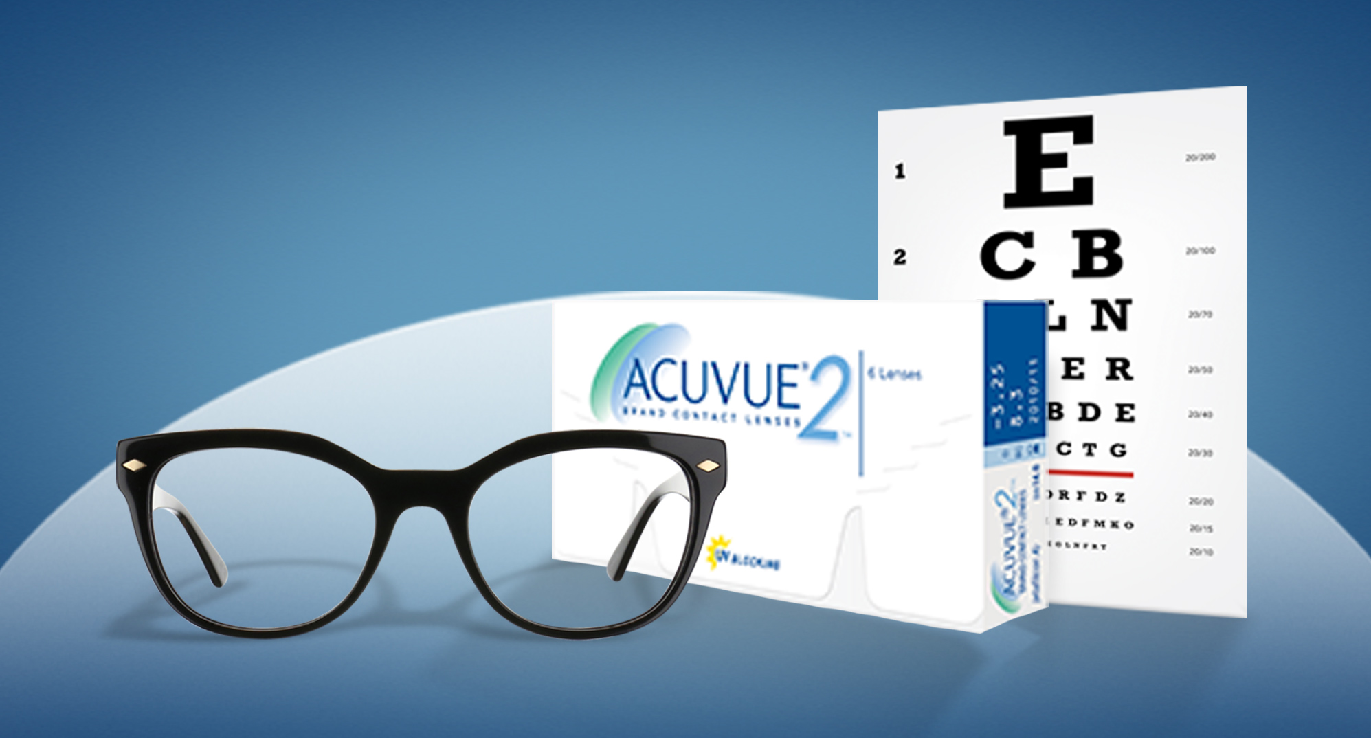 Pair of eyeglasses, box of contacts and Snellen chart
