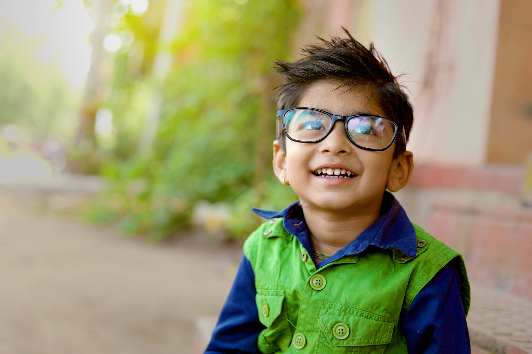 young boy wearing glasses
